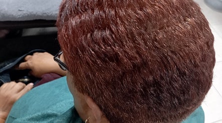 Closeup of freshly dyed red hair at Belindah the Hairdresser in Cape Town, Western Cape, ZA.