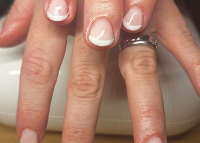 Elegant French manicure at Polished and Pretty, Crynant, Wales, GB. Perfect nails for every occasion.