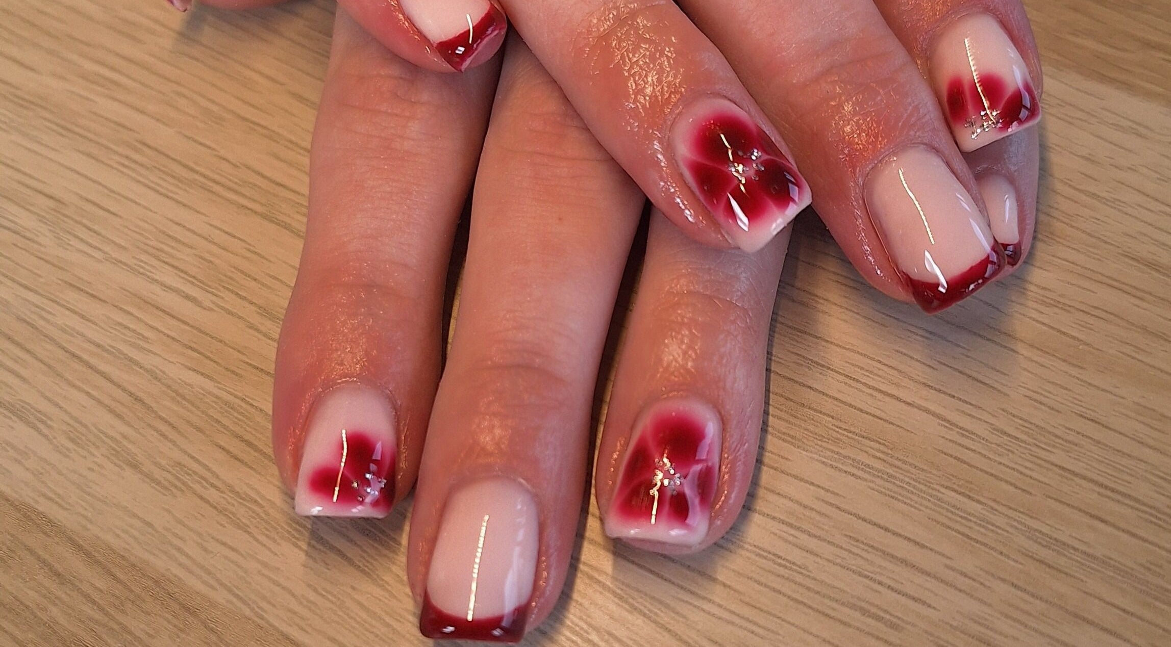 Beautiful red nail art at Polished and Pretty, Crynant, Wales, GB.