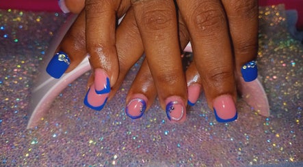Elegant blue and pink nail art with gems at Luv Ur Nails, Roseau, Saint George Parish, DM.