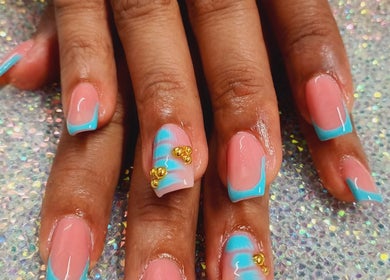 Stylish blue gel nails with gold accents at Luv Ur Nails, Roseau, Saint George Parish, DM.