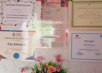 Certificates and price list displayed at Luv Ur Nails, Roseau, Saint George Parish, DM, highlighting services.
