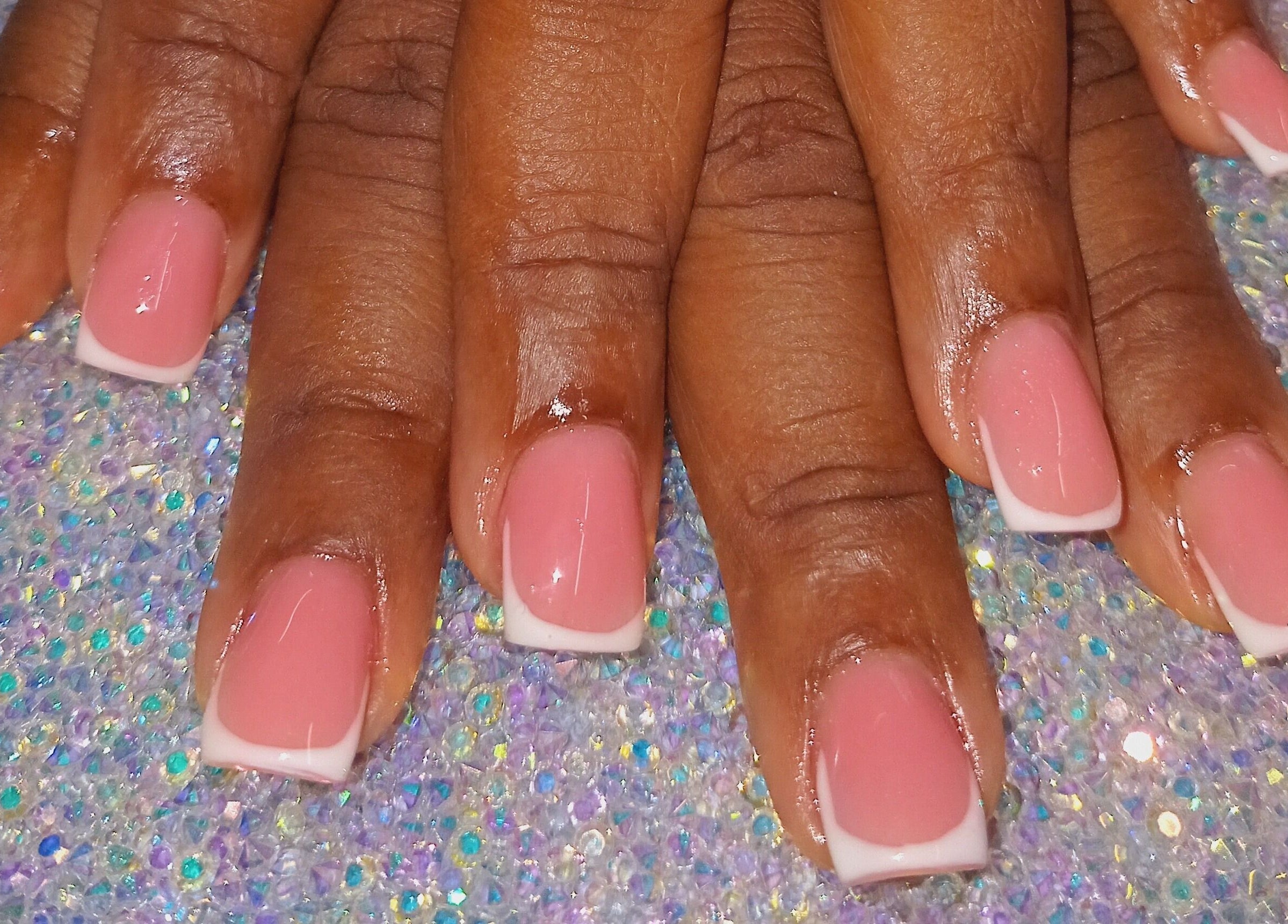 Elegant French manicure at Luv Ur Nails in Roseau, Saint George Parish, DM.