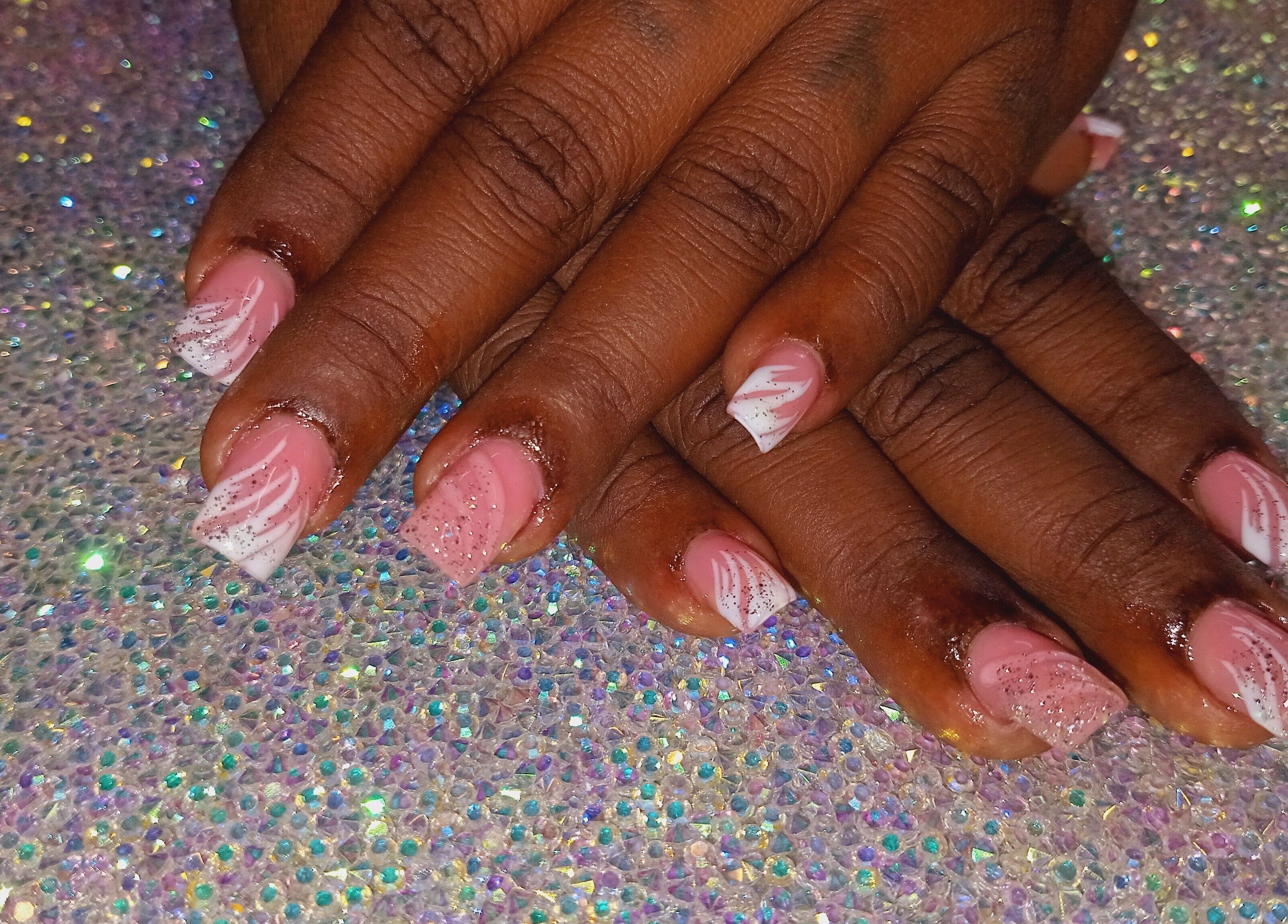 Pink and white glitter nails at Luv Ur Nails in Roseau, Saint George Parish, DM.