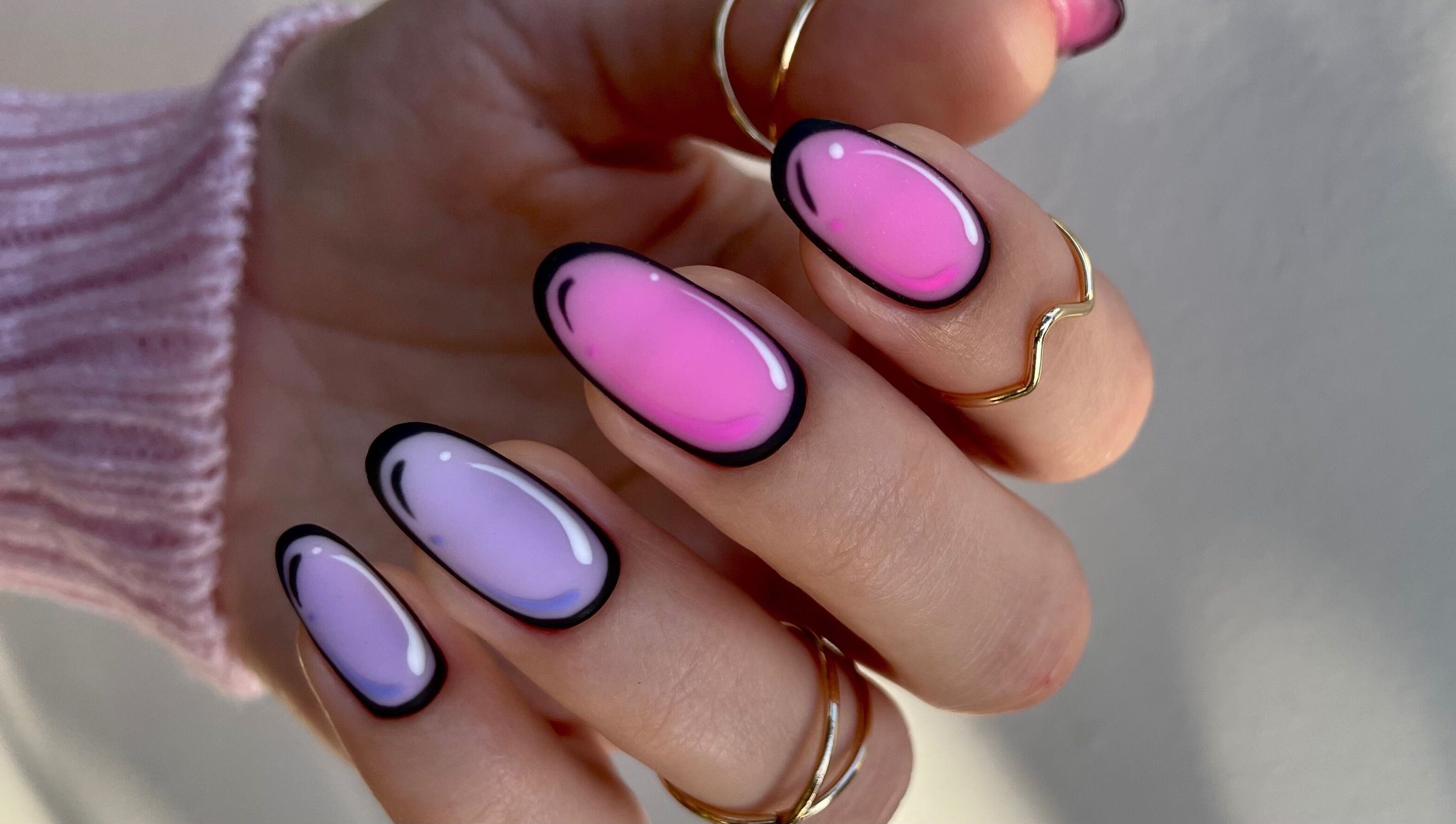 Gradient pink and purple nails by Nail Maniac Salon & Academy, Orlando, Florida, US. Stylish and trendy design.