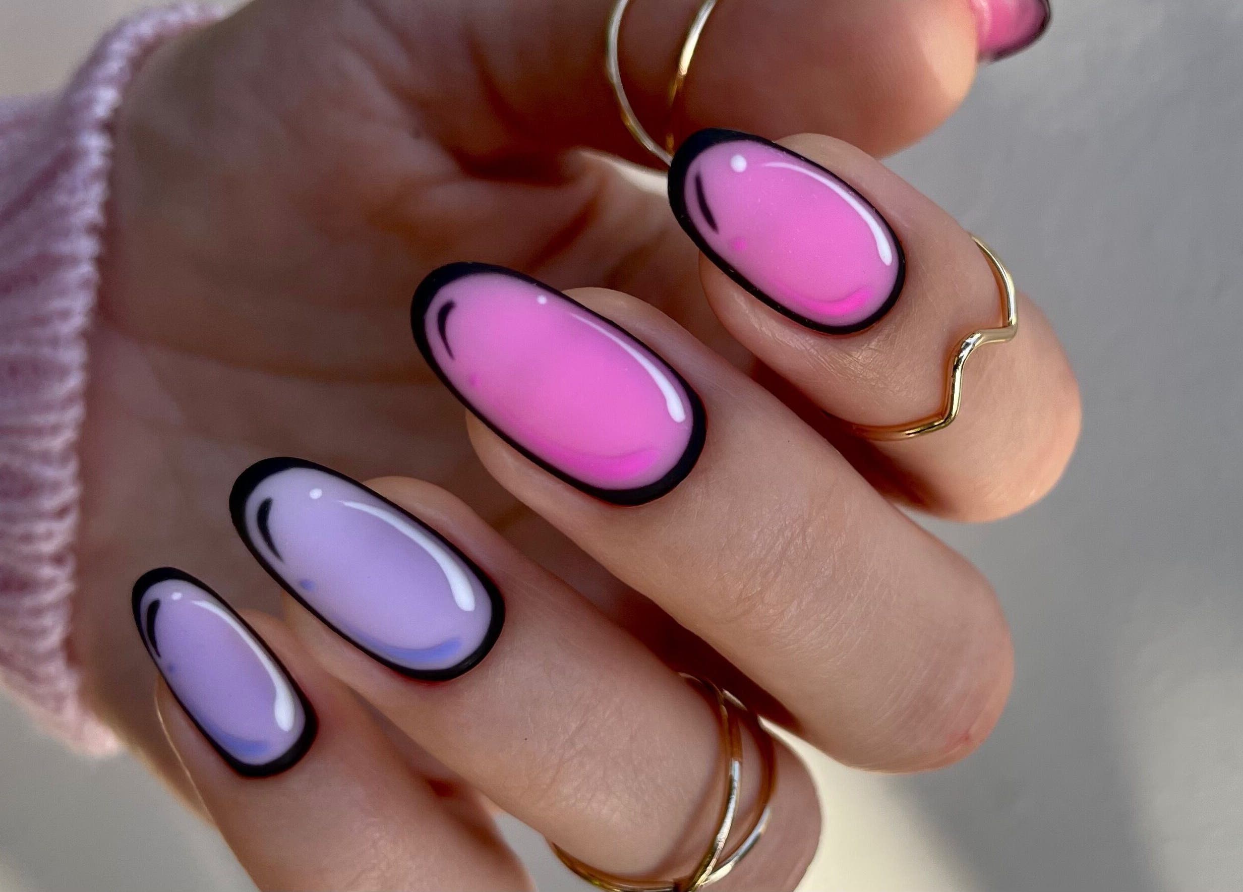 Gradient pink and purple nails by Nail Maniac Salon & Academy, Orlando, Florida, US. Stylish and trendy design.
