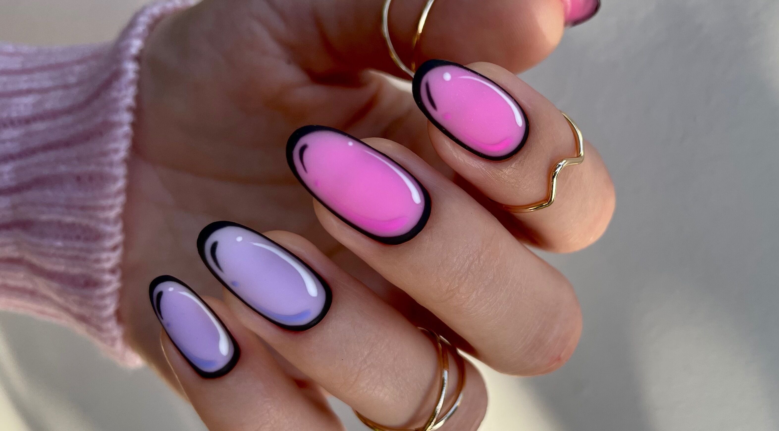 Gradient pink and purple nails by Nail Maniac Salon & Academy, Orlando, Florida, US. Stylish and trendy design.