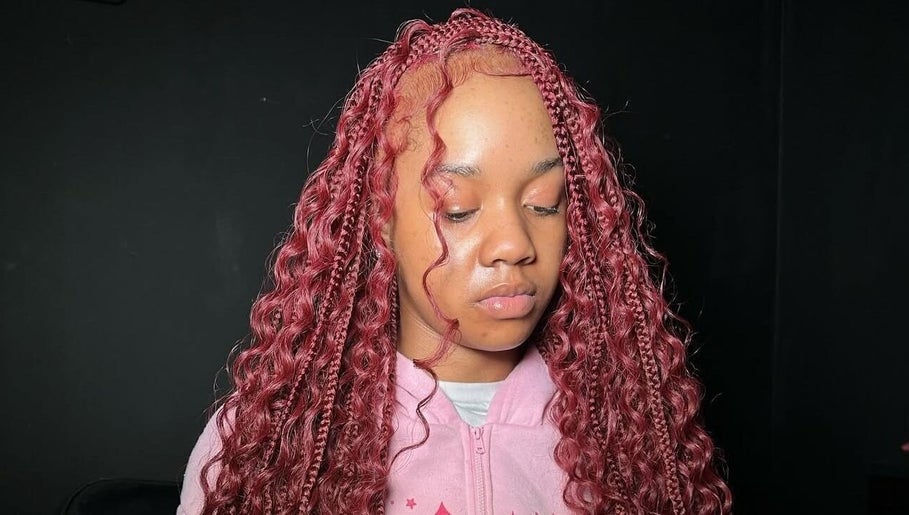 Elegant crimson braided curls at VixenChair, Concord, North Carolina, US.