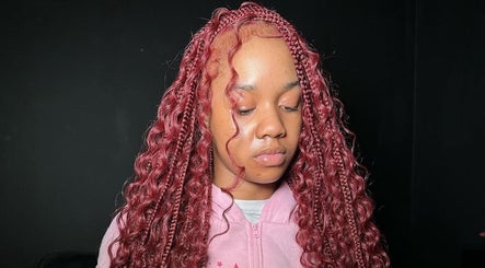 Elegant crimson braided curls at VixenChair, Concord, North Carolina, US.