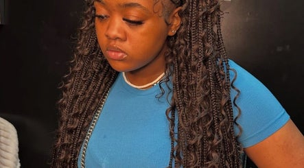 Intricate braids styled at VixenChair, Concord, North Carolina, US, showcasing expert hair craftsmanship.