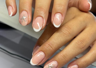Elegant French manicure at Nail and Needle Clinic, Great Warley, England, GB.