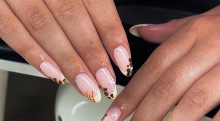 French manicure with floral art at BYGLT, Morriston, Wales, GB.