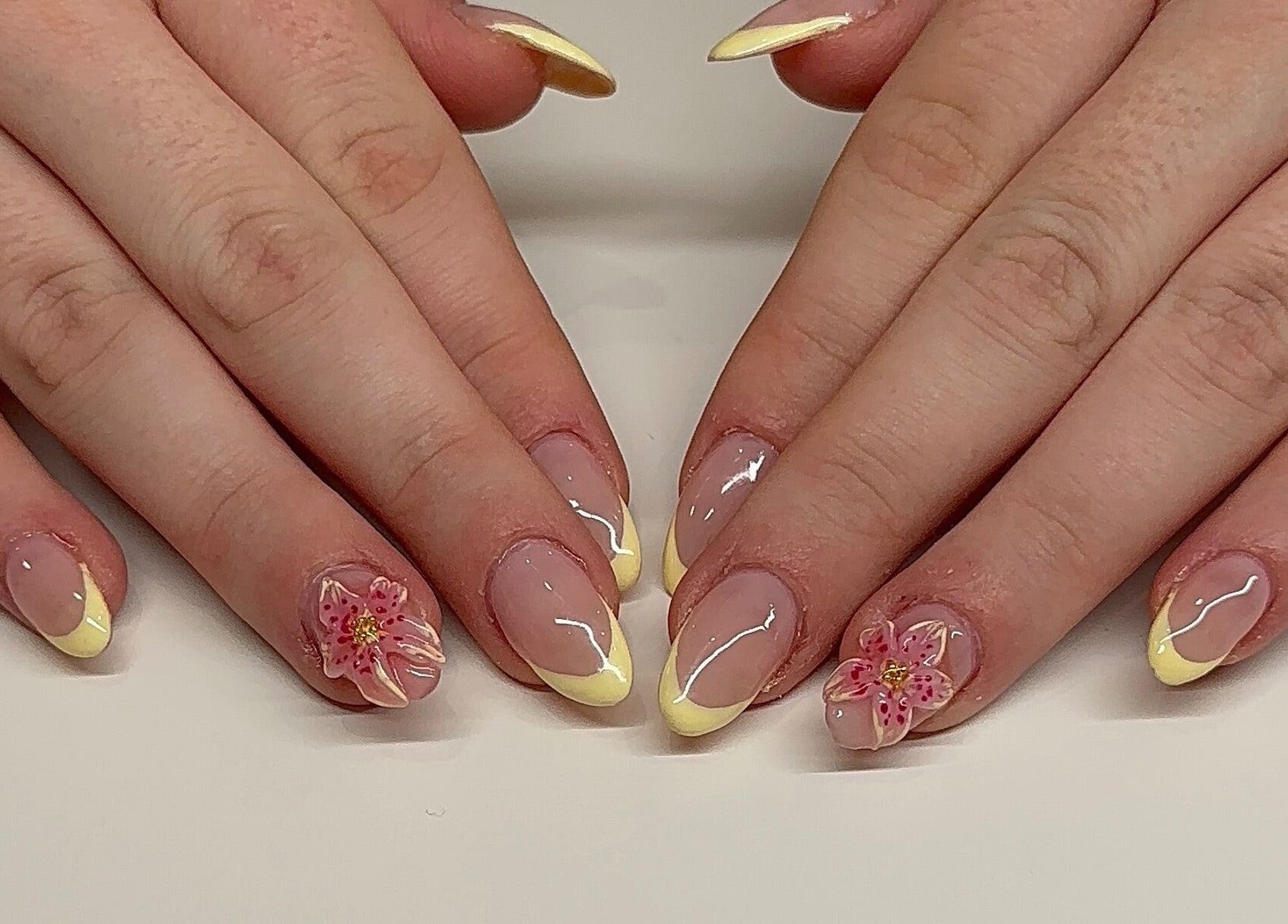 Floral nail art with yellow tips by Nails By Sar at Peak Crossing, Queensland, AU.