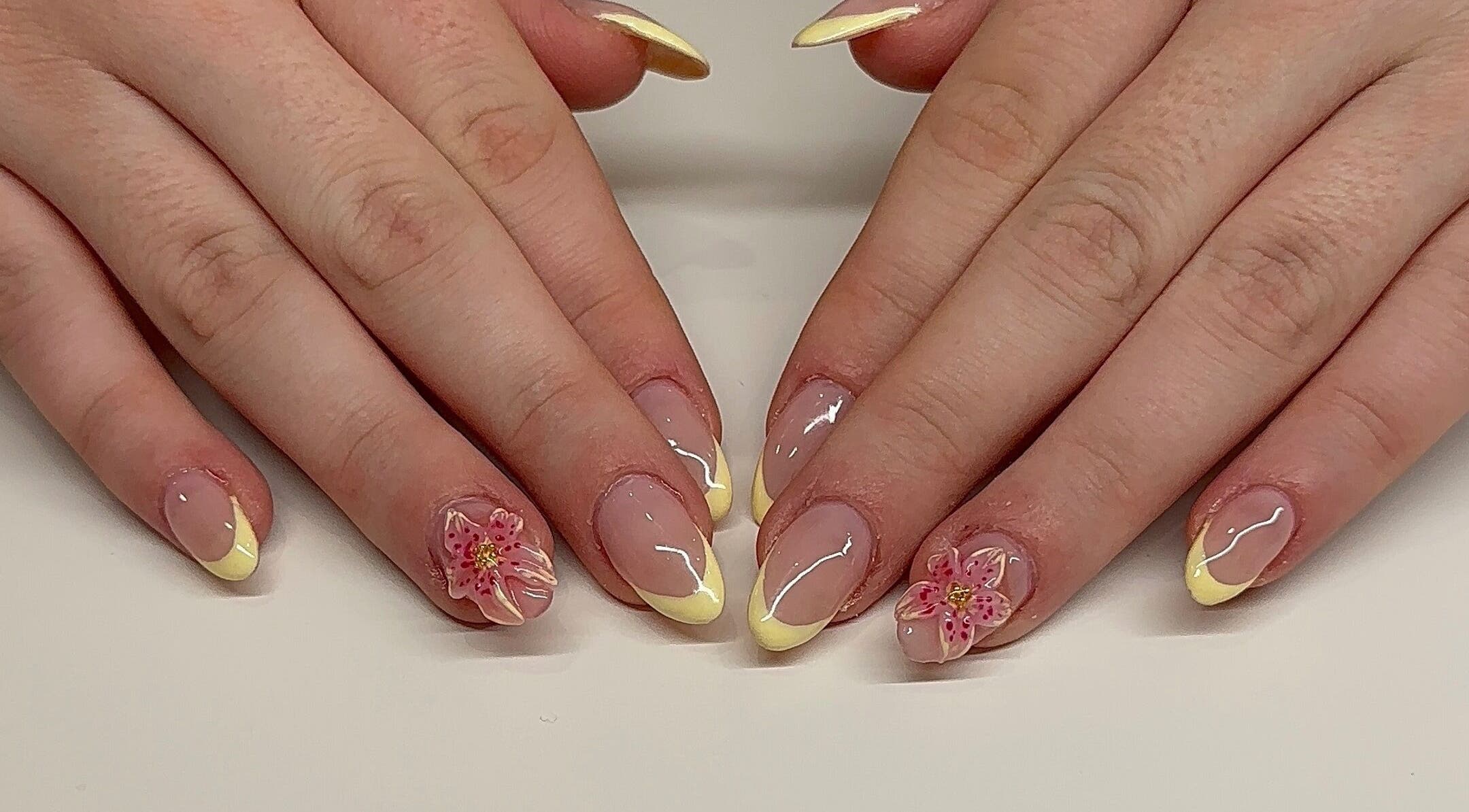 Floral nail art with yellow tips by Nails By Sar at Peak Crossing, Queensland, AU.