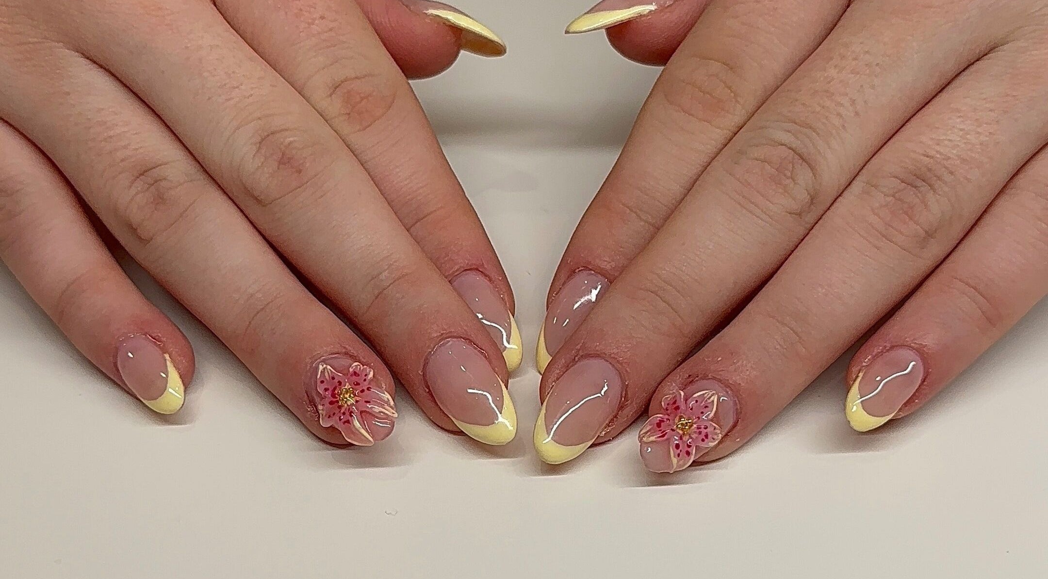 Floral nail art with yellow tips by Nails By Sar at Peak Crossing, Queensland, AU.