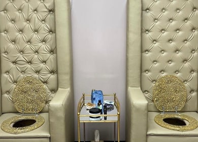 Elegant gold seating at The Divine Connection, Mississauga, Ontario, CA for luxury wellness treatments.