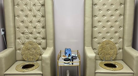 Elegant gold seating at The Divine Connection, Mississauga, Ontario, CA for luxury wellness treatments.