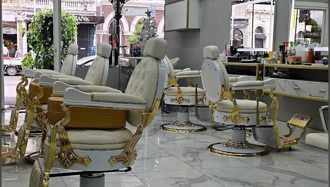 Elegant barber chairs at Chic Barber, Melbourne, Victoria, AU, showcasing luxury style and comfort.