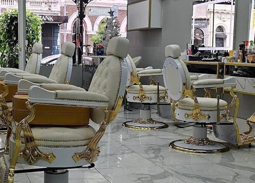 Elegant barber chairs at Chic Barber, Melbourne, Victoria, AU, showcasing luxury style and comfort.