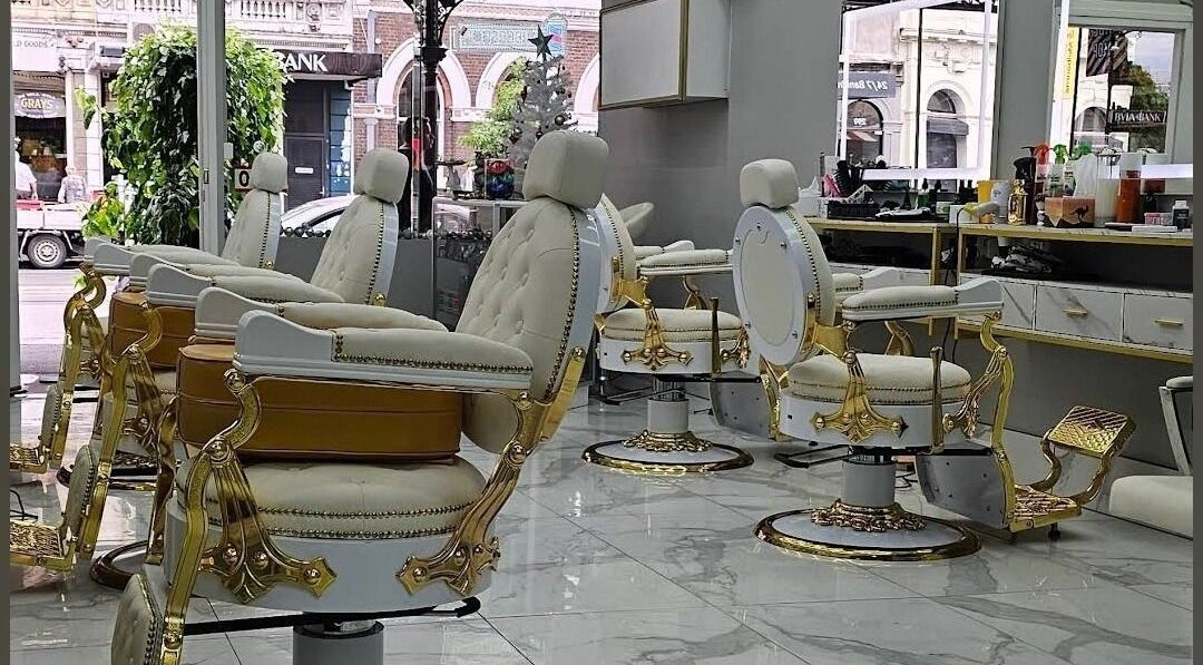Elegant barber chairs at Chic Barber, Melbourne, Victoria, AU, showcasing luxury style and comfort.