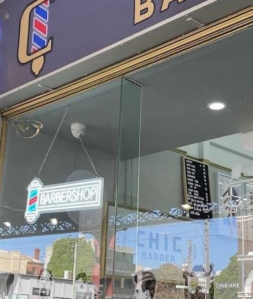 Chic Barber exterior with modern signage in Melbourne, Victoria, AU offering stylish grooming services.