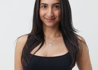 Smiling woman with sleek hair at Mia Lashed, Brampton, Ontario, CA, showcasing natural beauty and confidence.