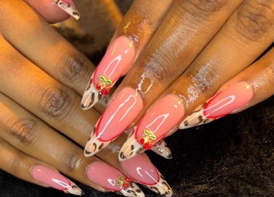 Stylish nail art at Nails By Amber J, Cape Town, Western Cape, ZA showcasing intricate designs and vibrant colors.