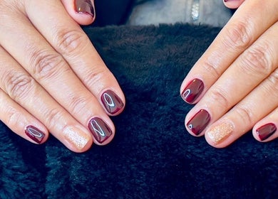 Elegant maroon nails with a glitter accent from Nails By Amber J, Cape Town, Western Cape, ZA.