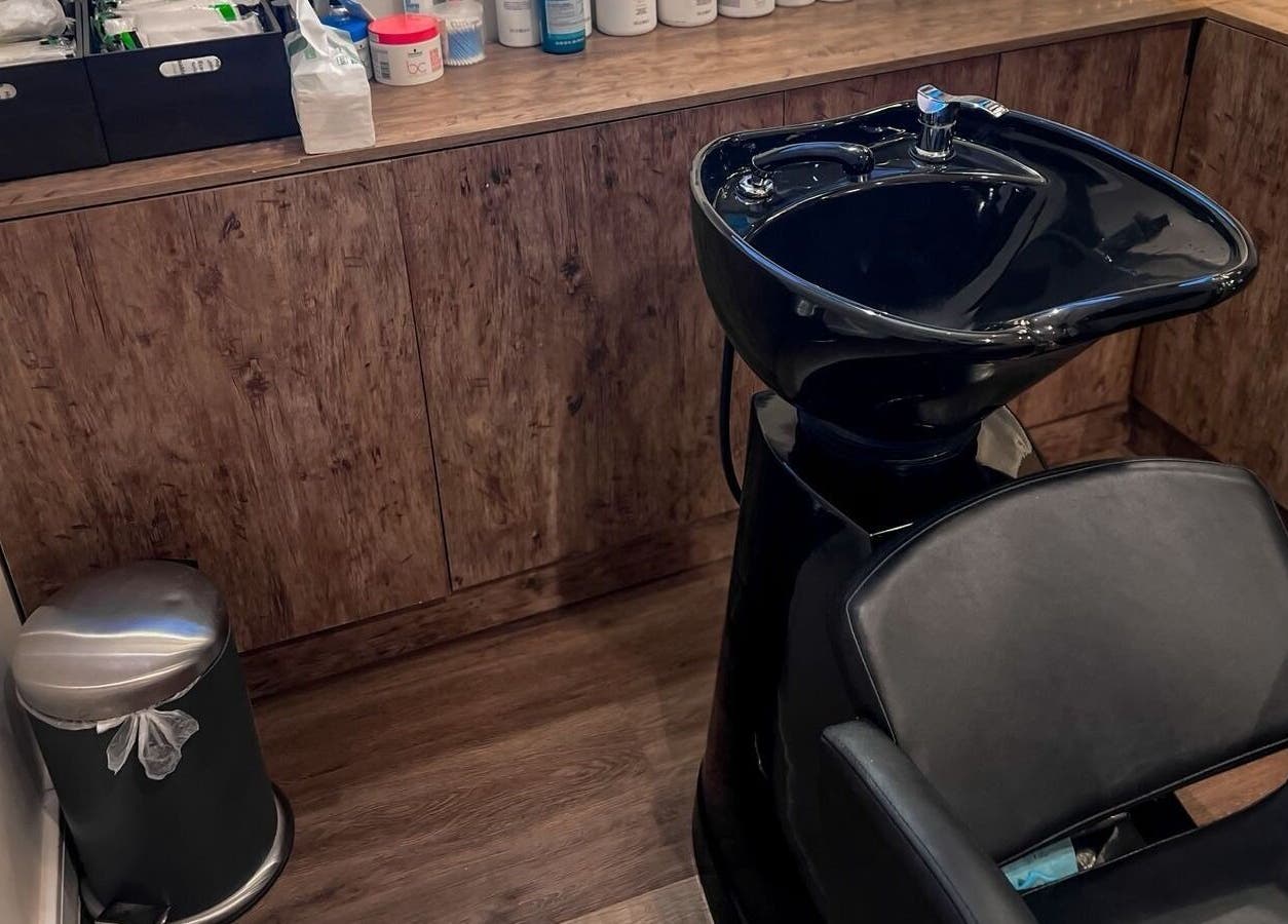 Modern hair washing station at Poco Pelo Barbershop, Al Khobar, Eastern Province, SA.