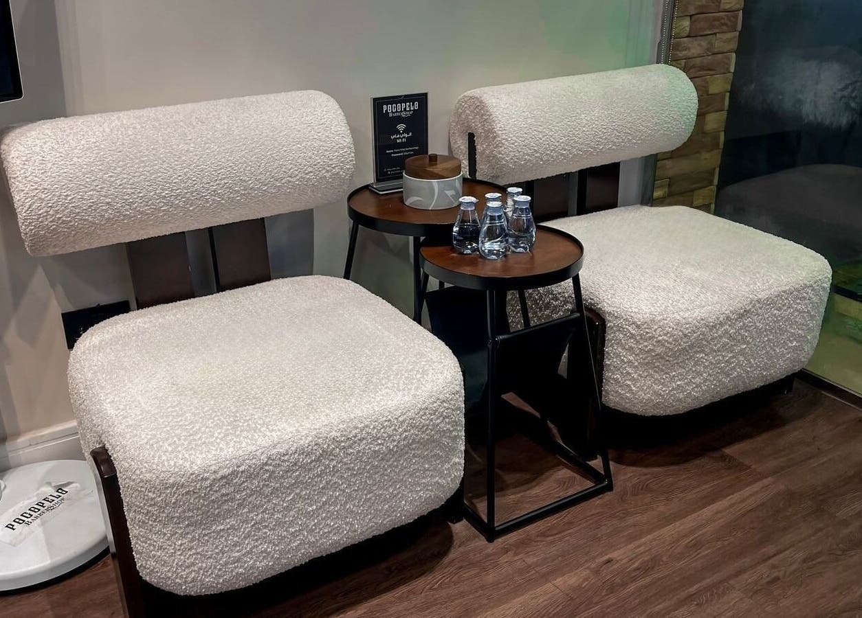 Comfortable seating area at Poco Pelo Barbershop in Al Khobar, Eastern Province, SA with modern chairs.