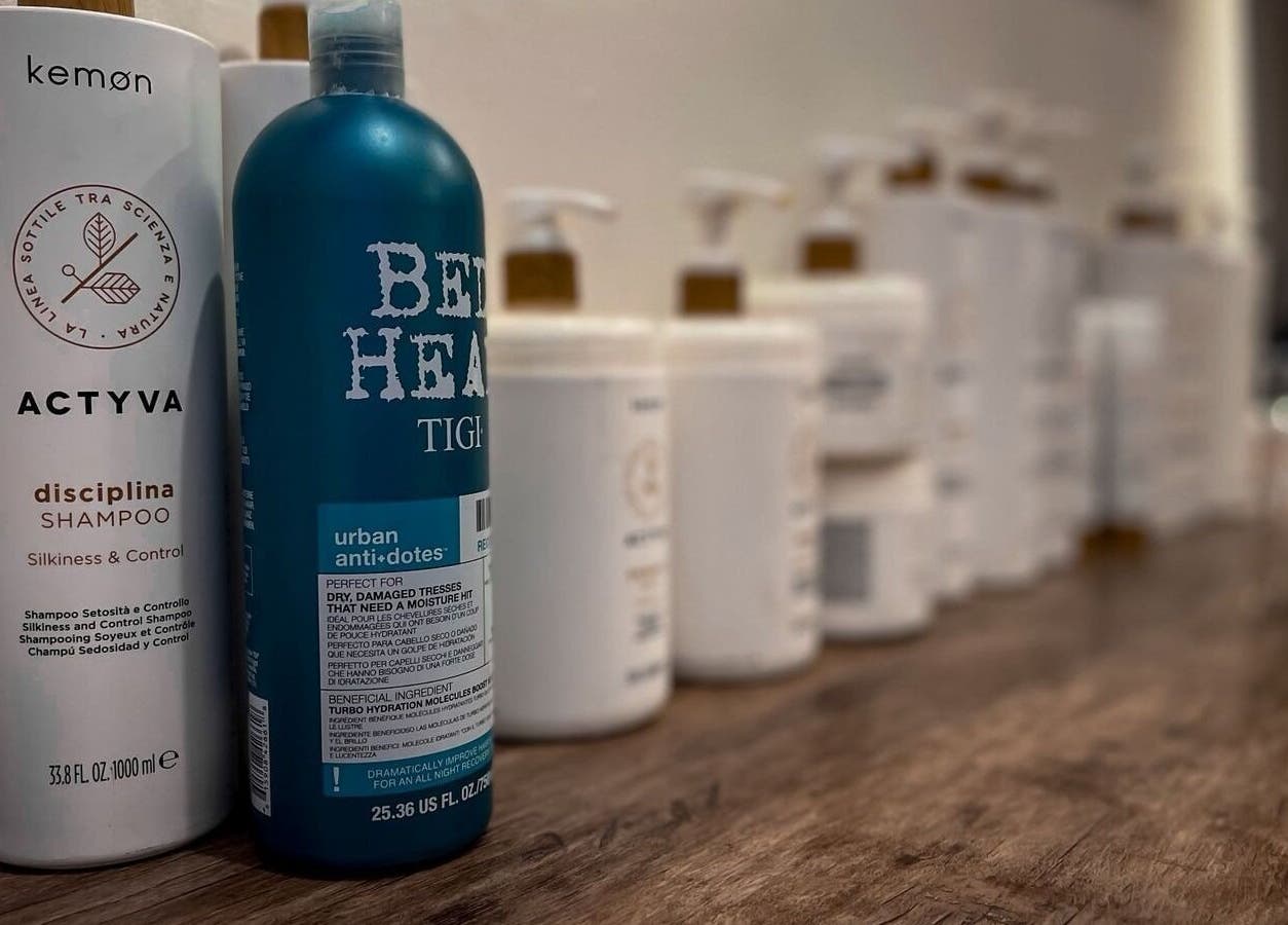 Shampoo bottles at Poco Pelo Barbershop, Al Khobar, Eastern Province, SA showcasing premium hair care.