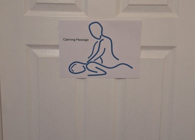 Sign with massage illustration at Calming-Massage in Blean, England, GB.