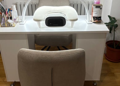 Elegant nail station at Nailin It by Leona in Hamilton, Scotland, GB with manicure tools and cuticle oil.