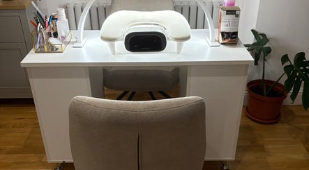 Elegant nail station at Nailin It by Leona in Hamilton, Scotland, GB with manicure tools and cuticle oil.