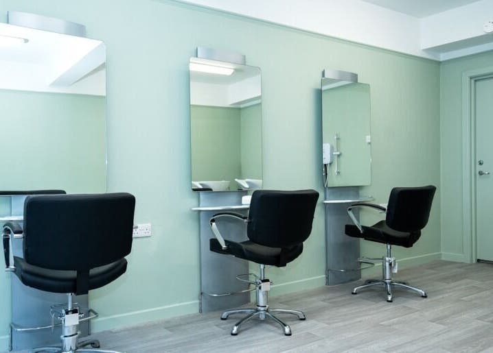 Modern salon chairs and mirrors at Silent Cuts, Downpatrick, Northern Ireland, GB.