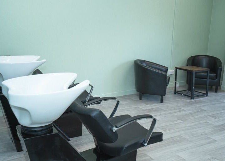 Chic salon wash station at Silent Cuts, Downpatrick, Northern Ireland, GB offers a soothing experience.