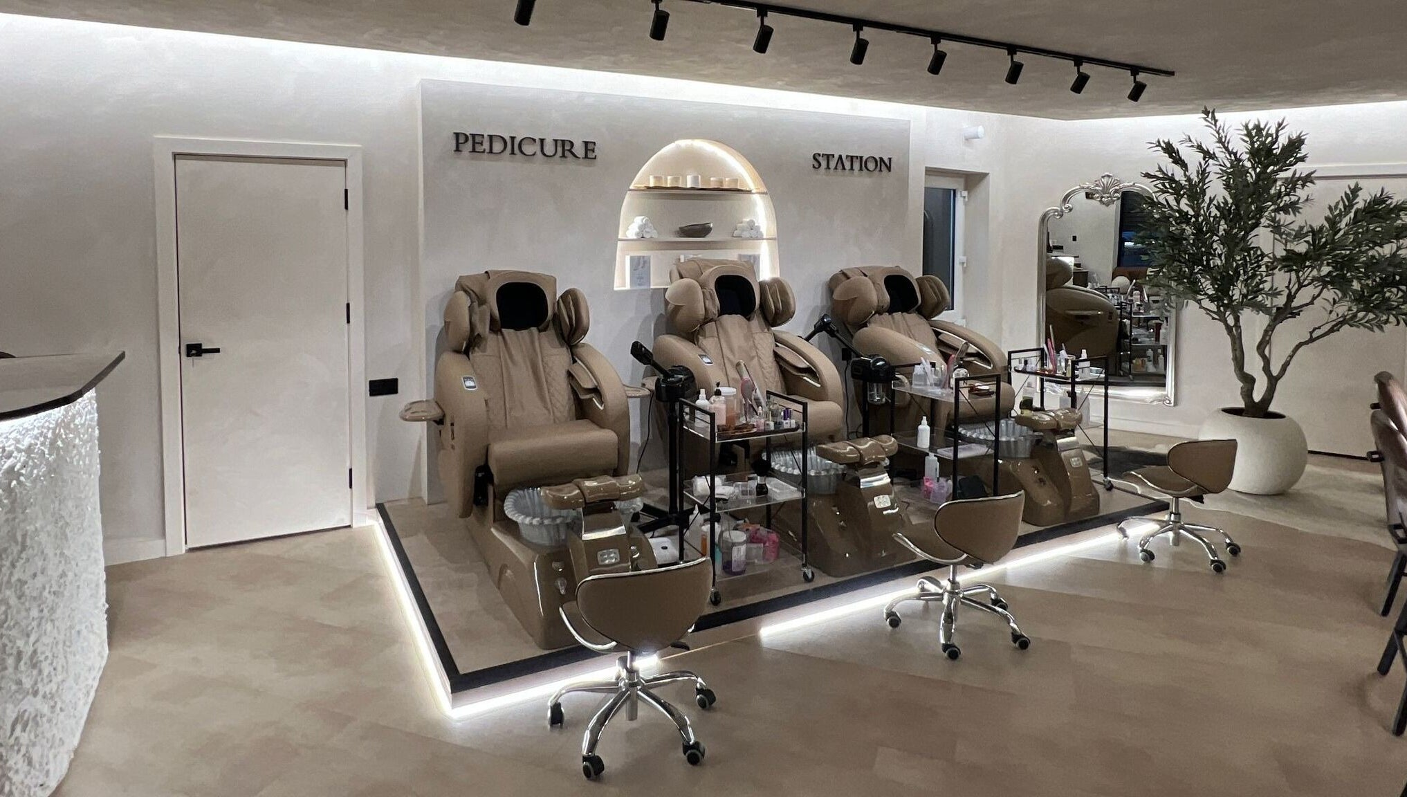 Luxurious pedicure chairs at Naughty Nails in Birmingham, England, GB, offering a relaxing spa experience.