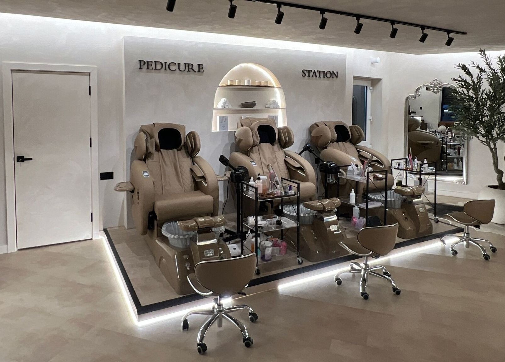 Luxurious pedicure chairs at Naughty Nails in Birmingham, England, GB, offering a relaxing spa experience.