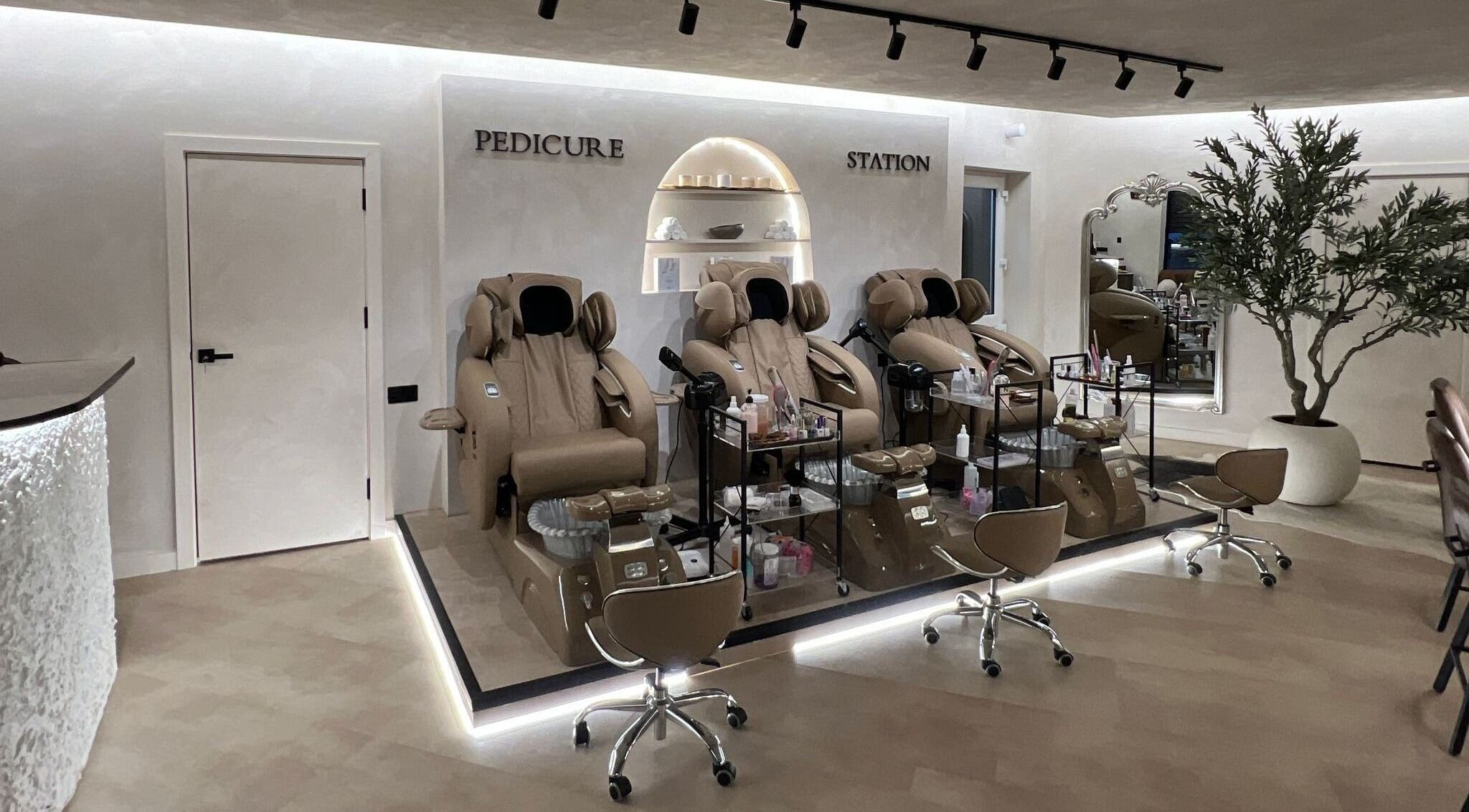 Luxurious pedicure chairs at Naughty Nails in Birmingham, England, GB, offering a relaxing spa experience.