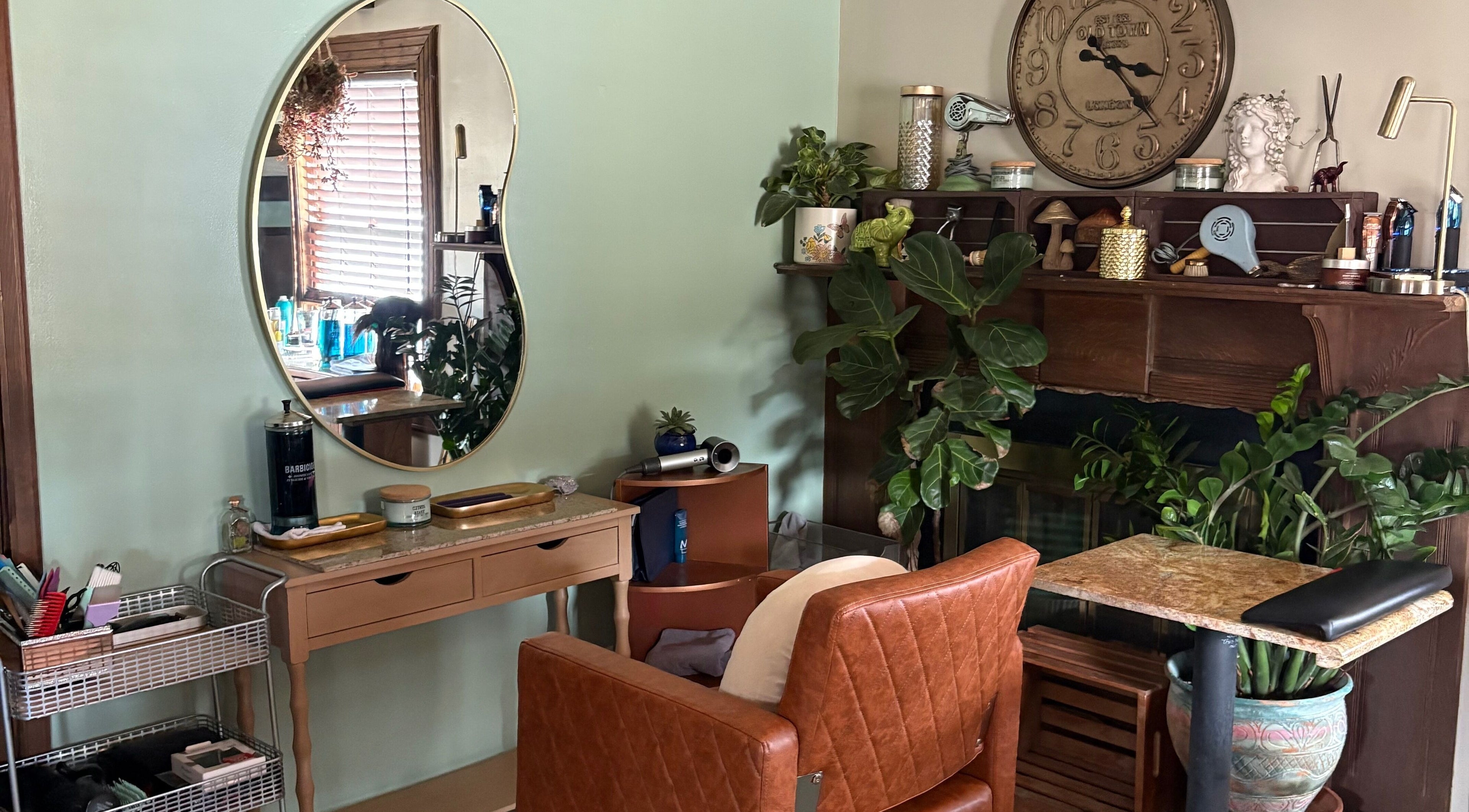 Elegant setting at Oceana Beauty in Nederland, Colorado with chic mirror and cozy decor.
