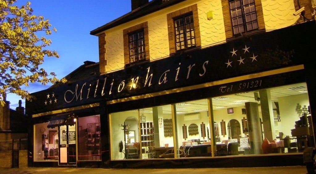 The Definery's warmly lit facade in Bradford, England, GB, showcasing inviting interior beauty spaces.