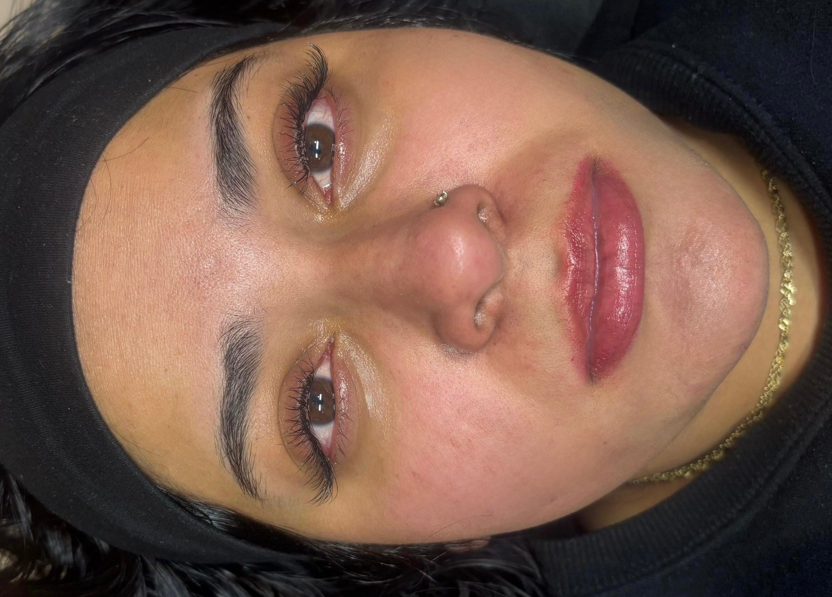 Client with enhanced lashes at Aura Lash Studio, Midrand, Gauteng, ZA. Ideal lash treatment results.