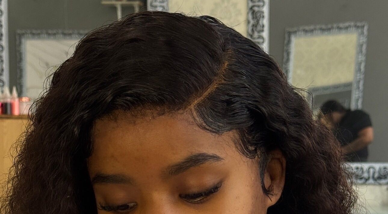 Intricate hair styling session at HAIRSURETY PTY (LTD) in Johannesburg, Gauteng, ZA showcasing expert techniques.