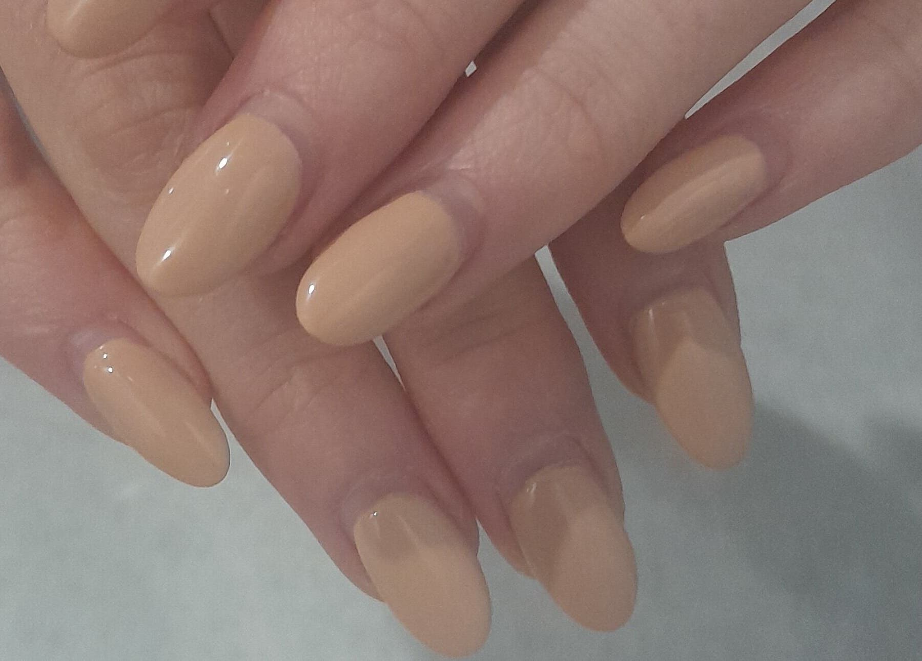 Elegant beige manicure by Emmy's nails, located in Cape Town, Western Cape, ZA, showcasing beautiful nail art.