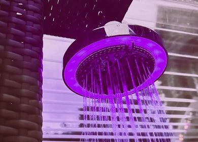 Luxurious violet-lit shower at Plas Courtyard Spa, Llanbedr, Wales, GB for ultimate relaxation.