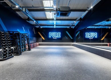 Iron Minds Coaching gym with neon lighting in Letchworth Garden City, England, GB.