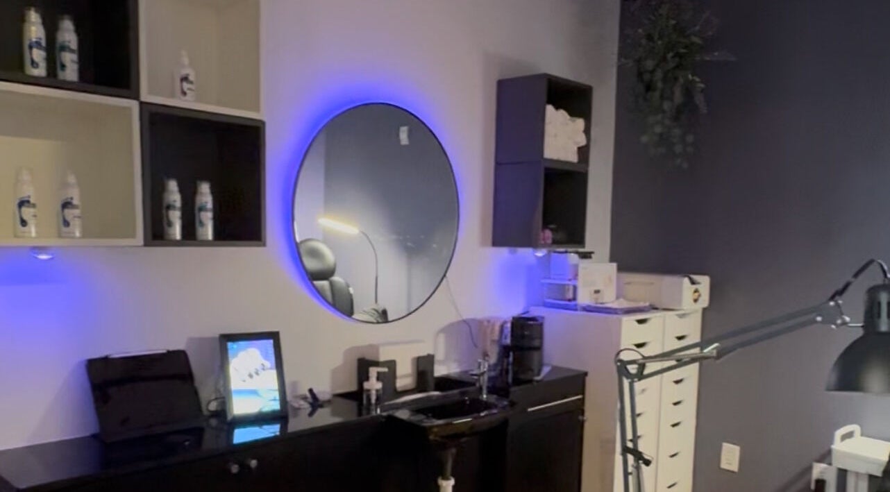 Stylish interior of Nail Esthetique in Maitland, Florida, US, featuring modern decor and soothing lighting.