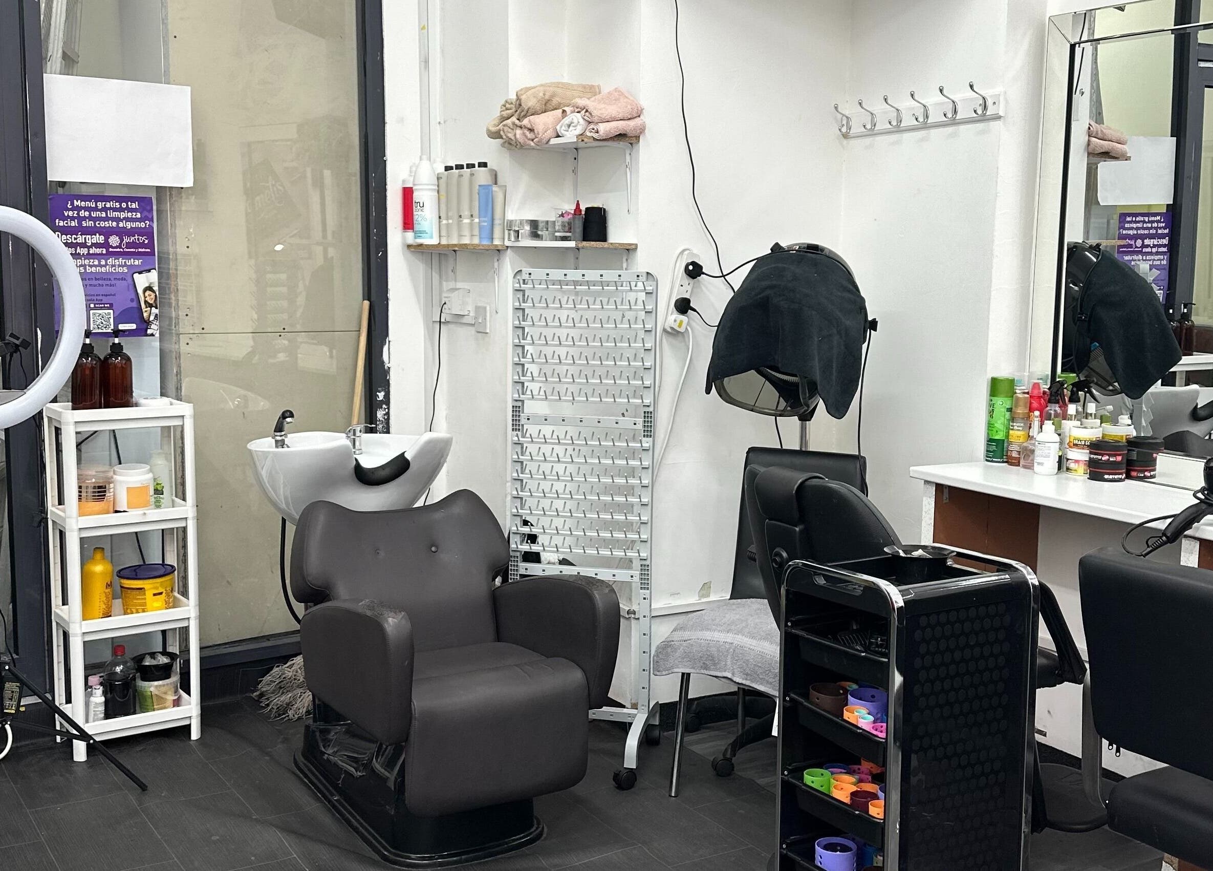 Modern salon setup at Zulymar Beauty & Health, London, England, GB, showcasing stylish chairs and equipment.