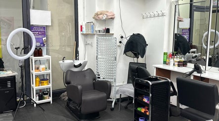 Modern salon setup at Zulymar Beauty & Health, London, England, GB, showcasing stylish chairs and equipment.