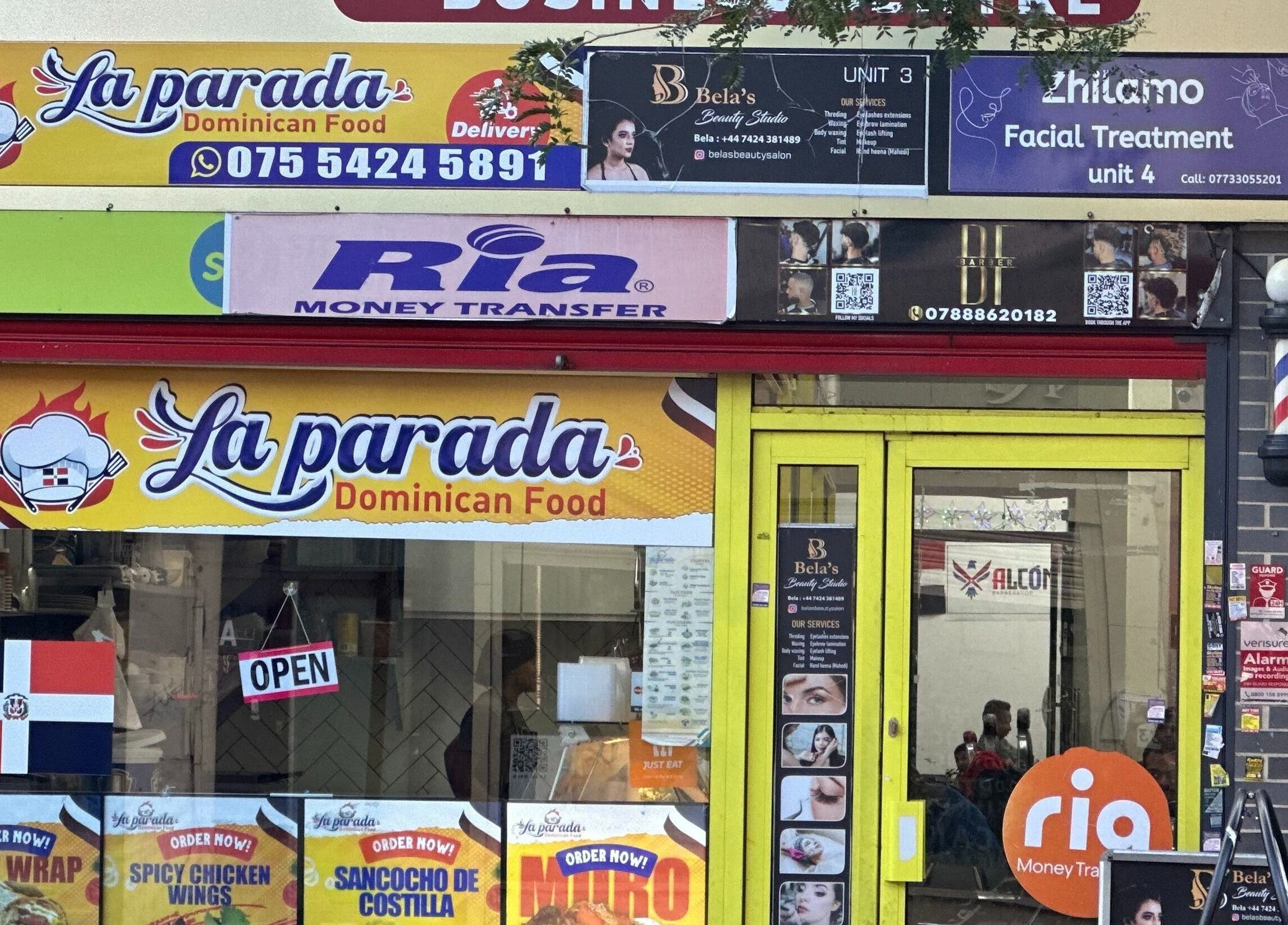 Front view of Zulymar Beauty & Health in London, England, GB, displaying signs for beauty services.